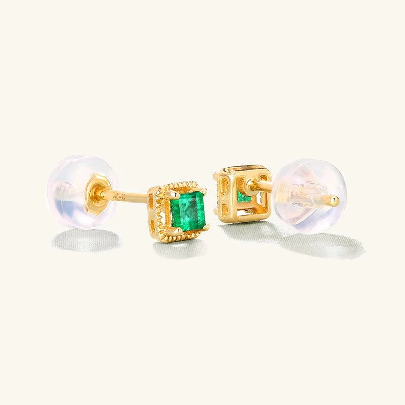 Charismatische goldene Smaragd-Ohrstecker