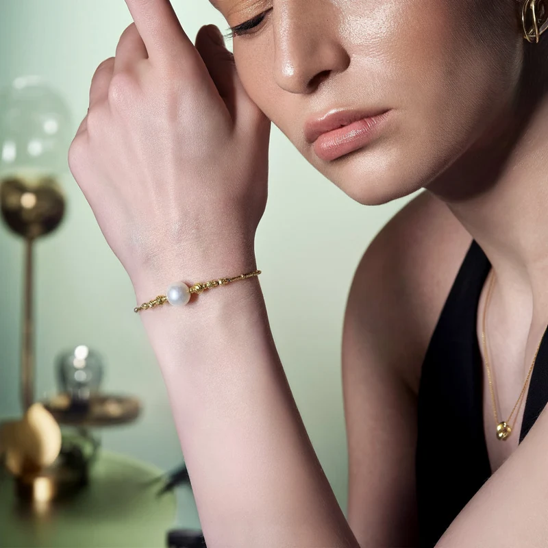 Solitär-Perlenarmband aus Gold