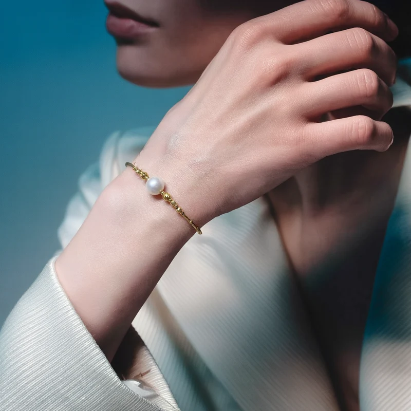 Solitär-Perlenarmband aus Gold