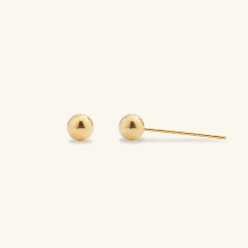 Glänzende goldene Kugel-Ohrstecker