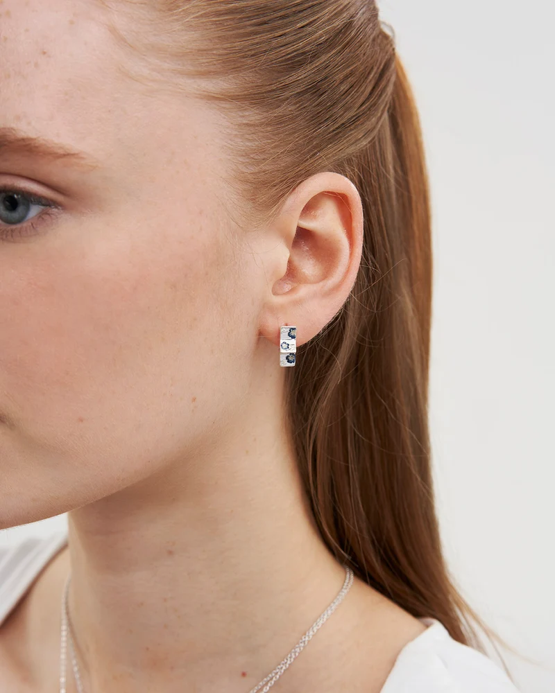 Larkspur Huggie Earrings in Silver