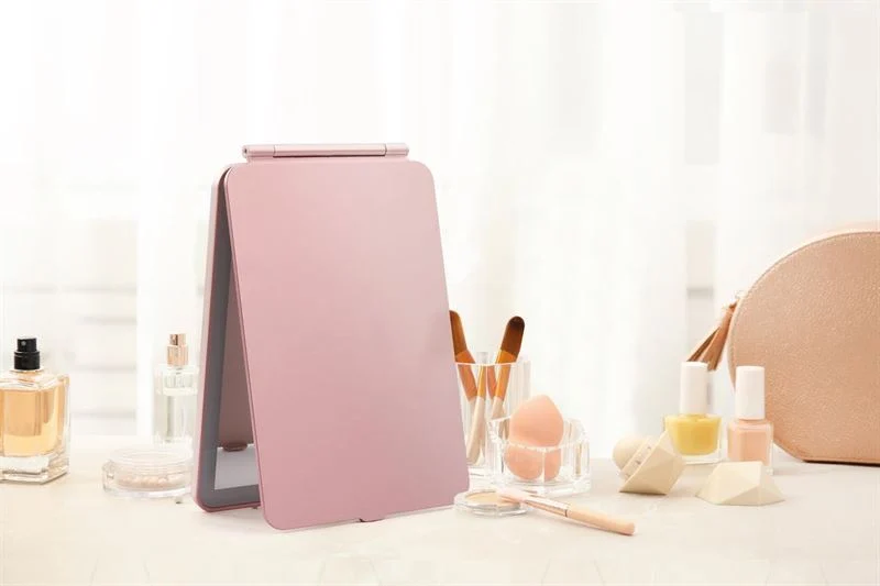 UNIQ Wiederaufladbarer LED-Reise-Schminkspiegel – Rosa | Zusammenklappbarer Kosmetikspiegel, 3 Lichtmodi, USB wiederaufladbar