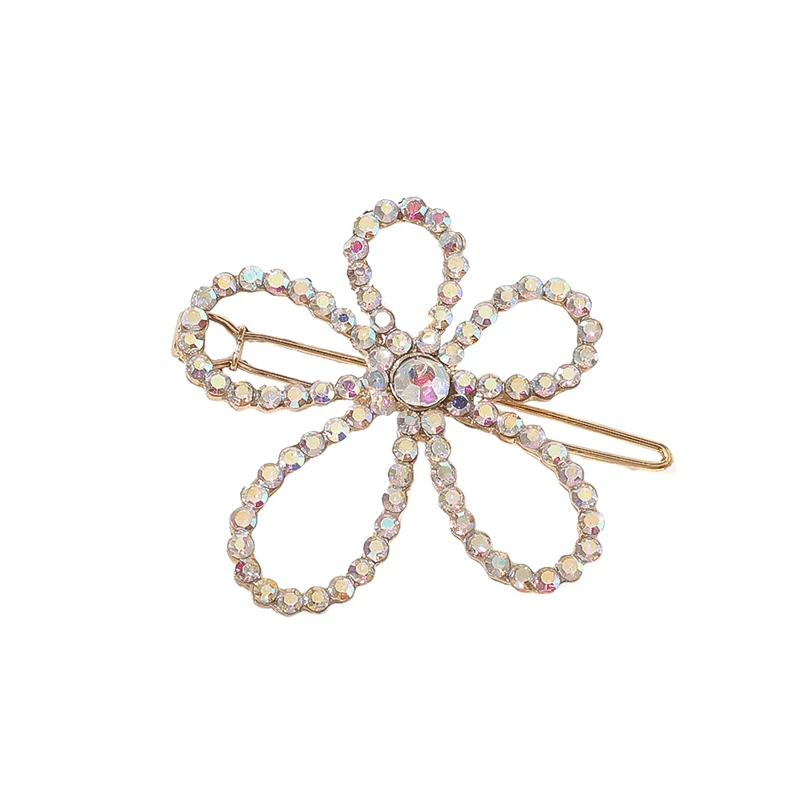 Chris Rubin Evie Haarspange – Blume goldfarben