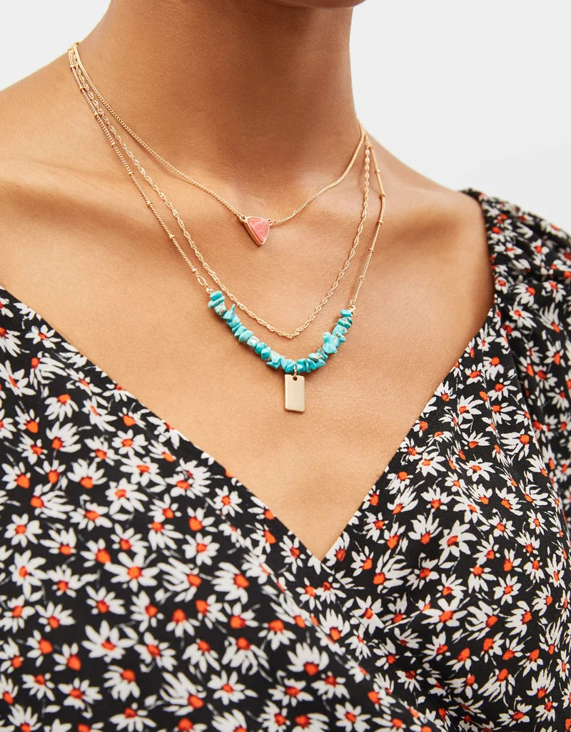 Set of necklaces with stone motifs