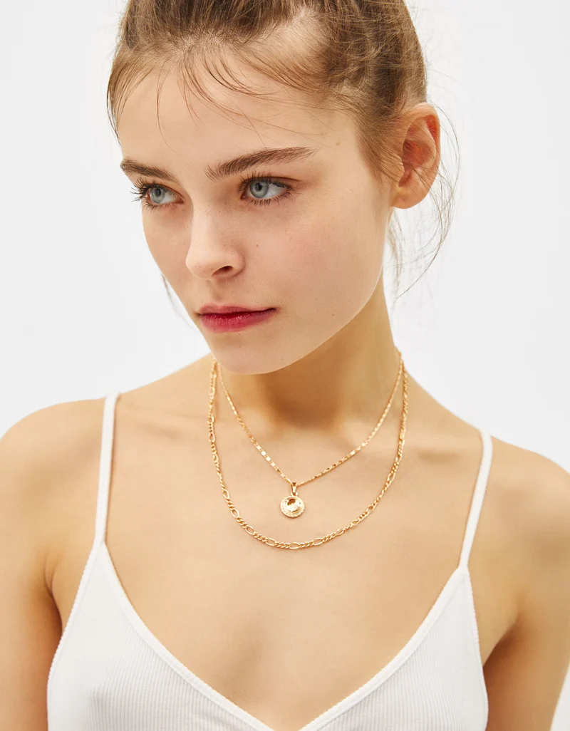 Multi-strand chain necklace with medallion