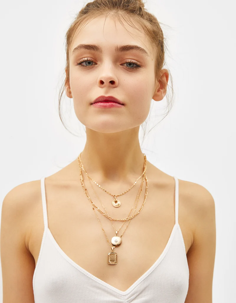 Multi-strand chain necklace with medallion